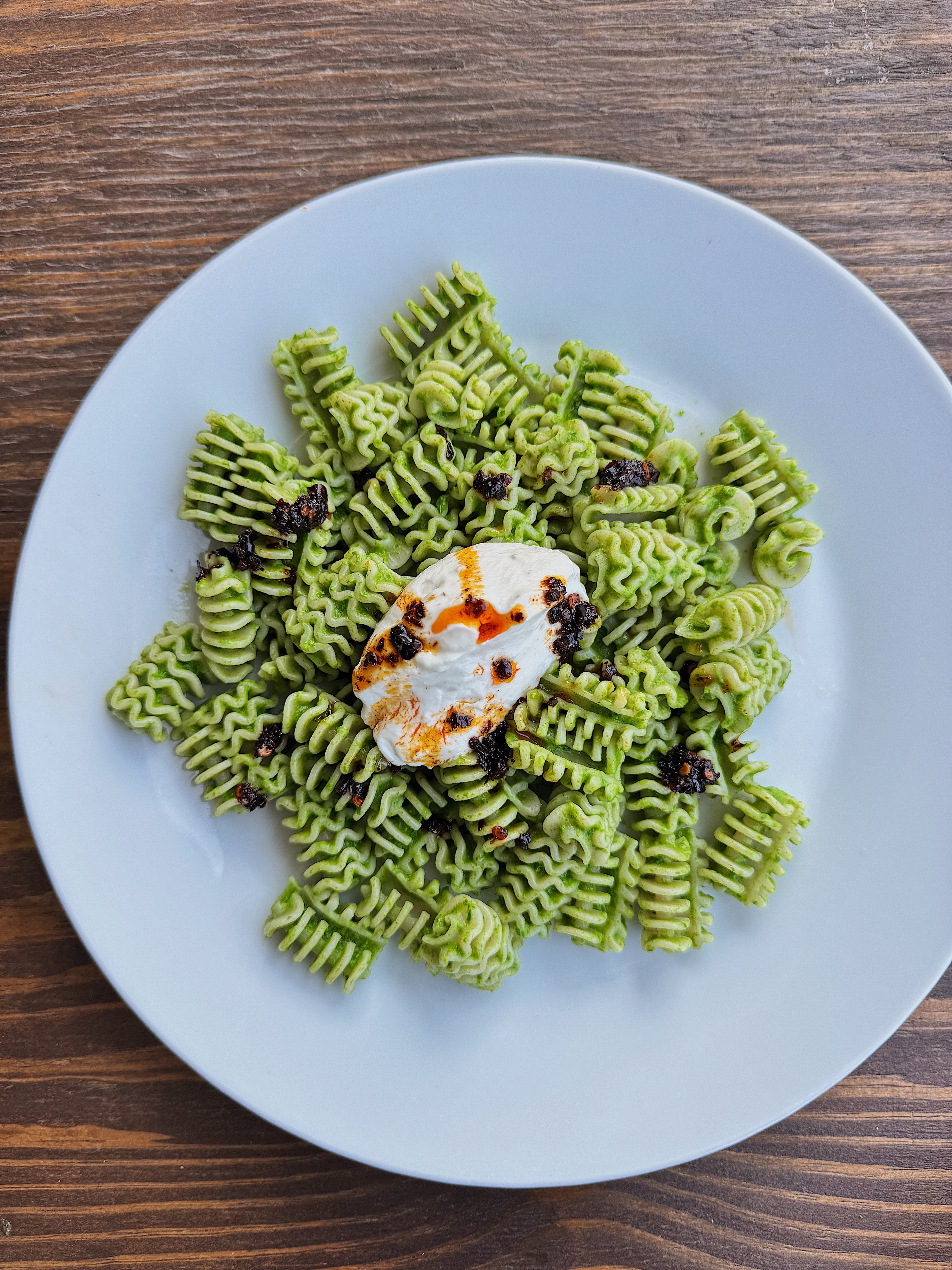 Radiatori with Rocket sauce, Whipped Ricotta and Chilli Crisp
